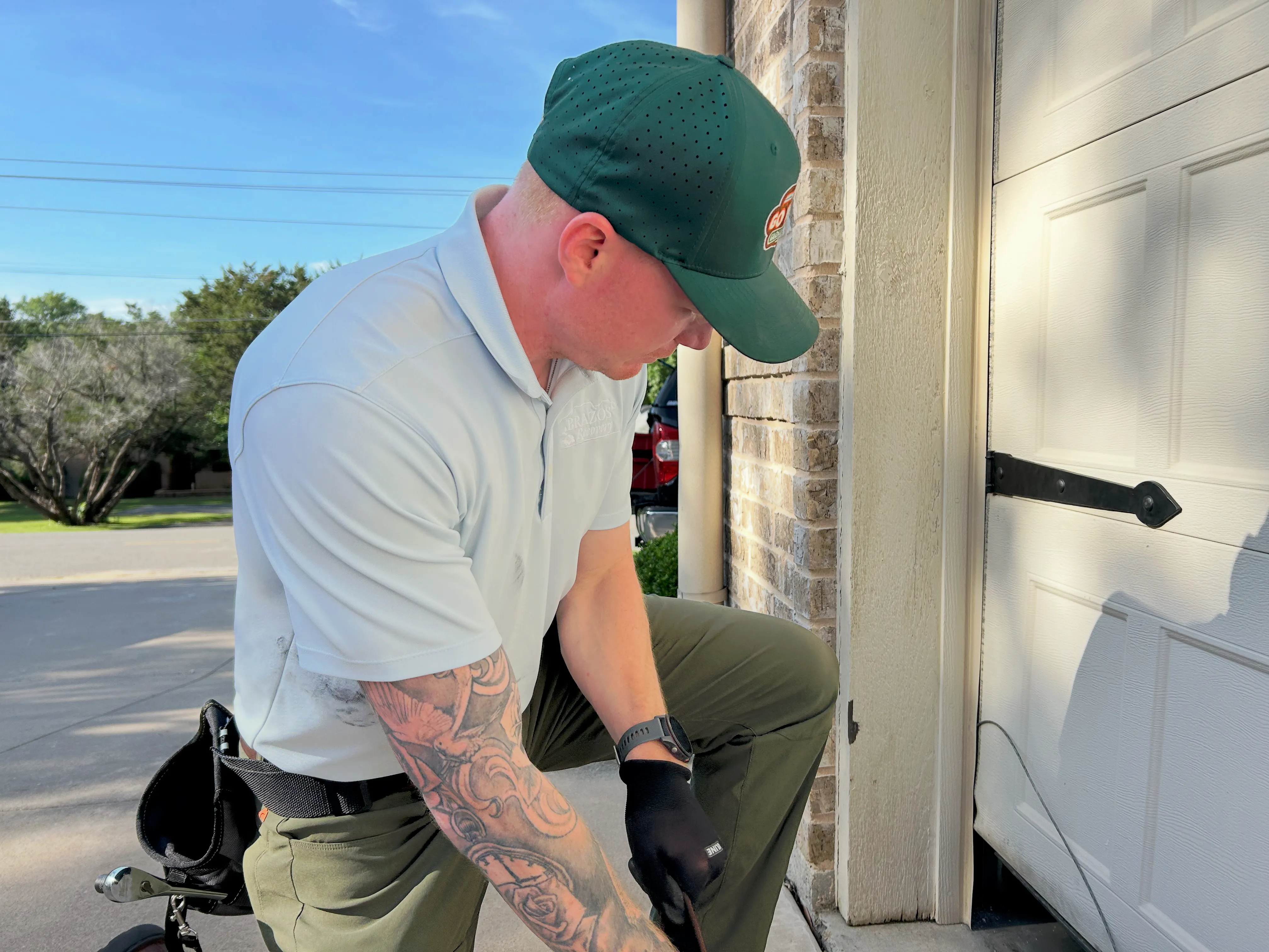 Go Nuts Garage Door technician servicing a garage door in Cleburne, TX