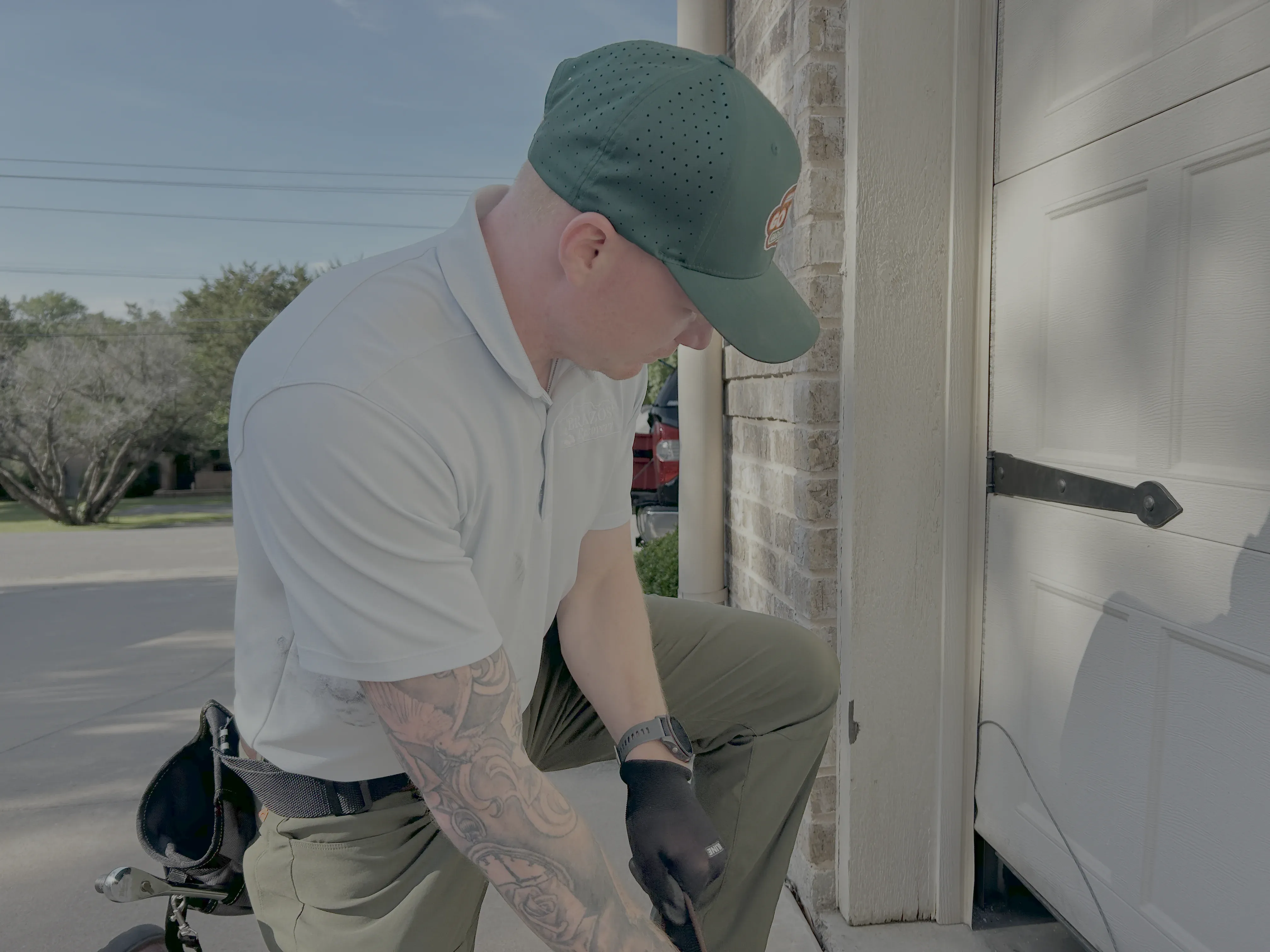 Go Nuts Garage Door technician replacing garage door weatherstripping in Granbury, TX