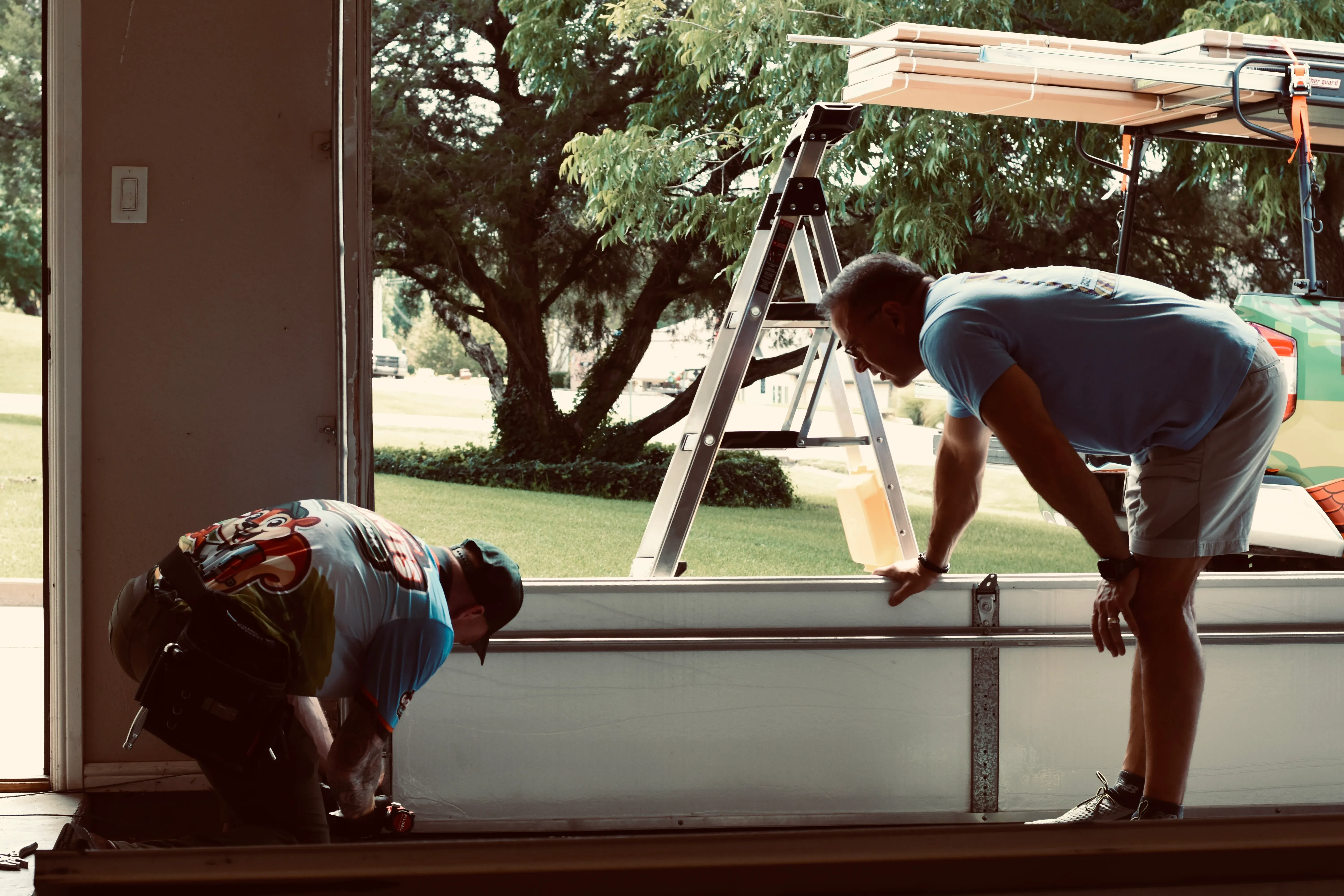 Go Nuts Garage Door technician installing a garage door opener in Glen Rose, TX