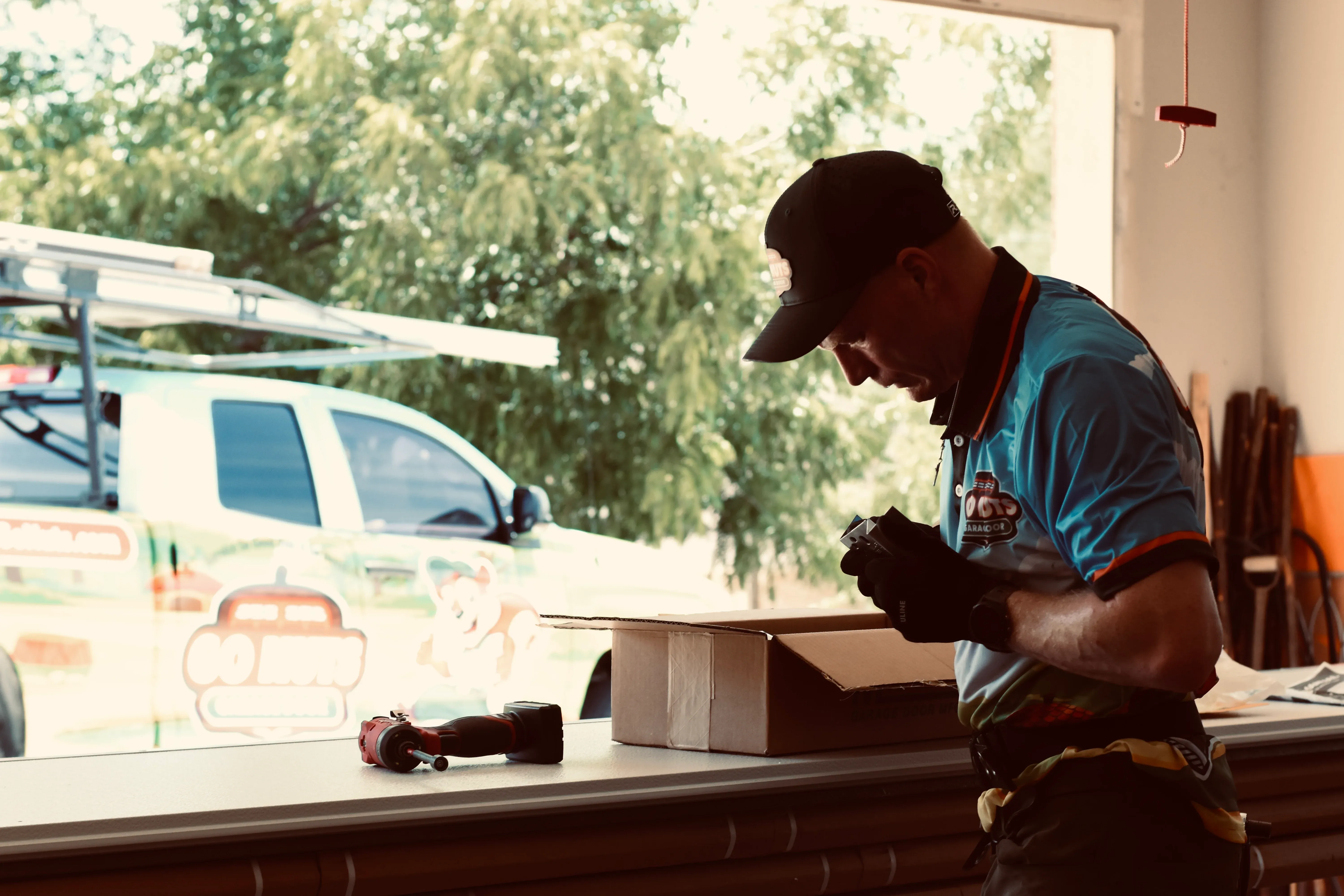 Go Nuts Garage Door technician replacing garage door weatherstripping in Benbrook, TX